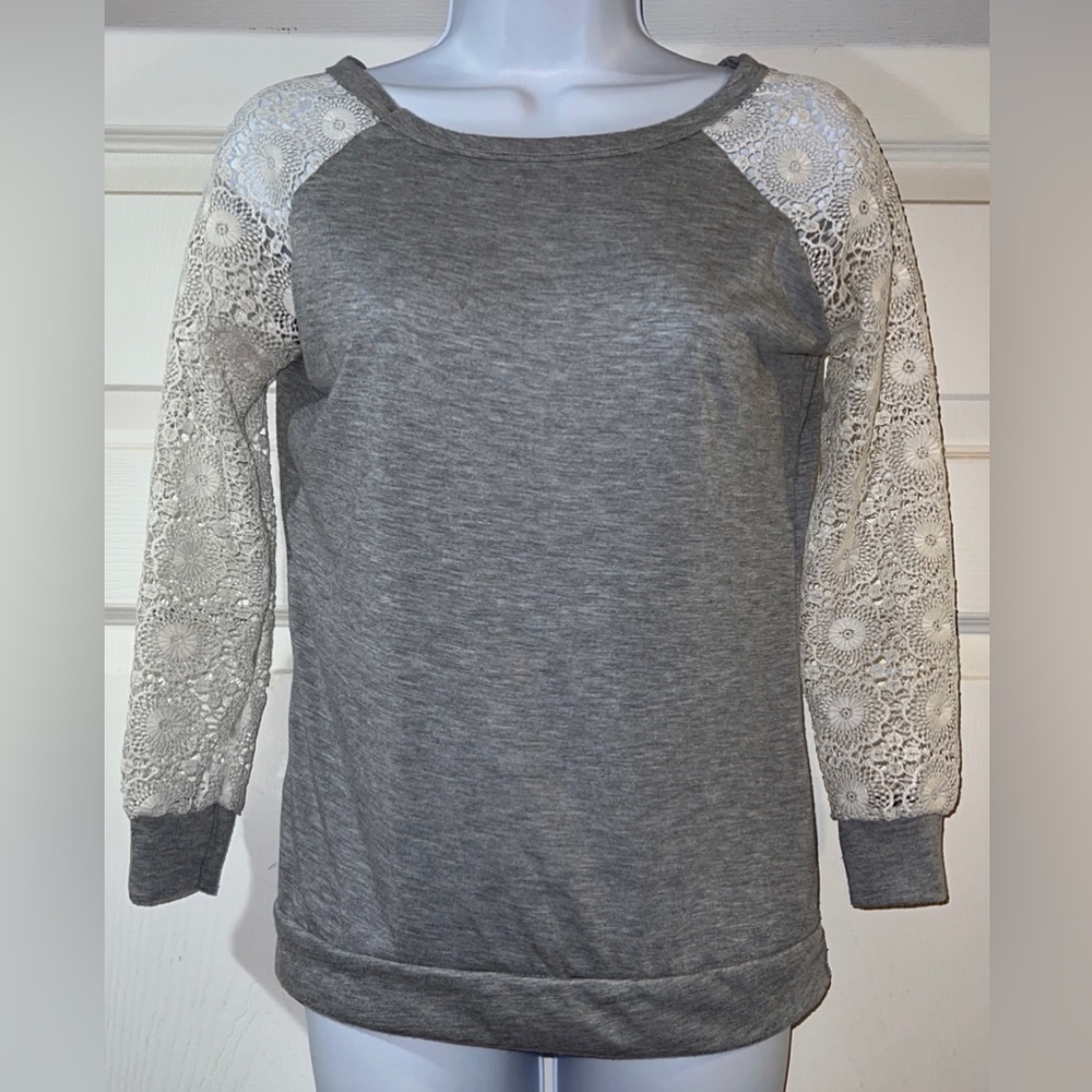Gray long sleeve shirt with white lace sleeves
